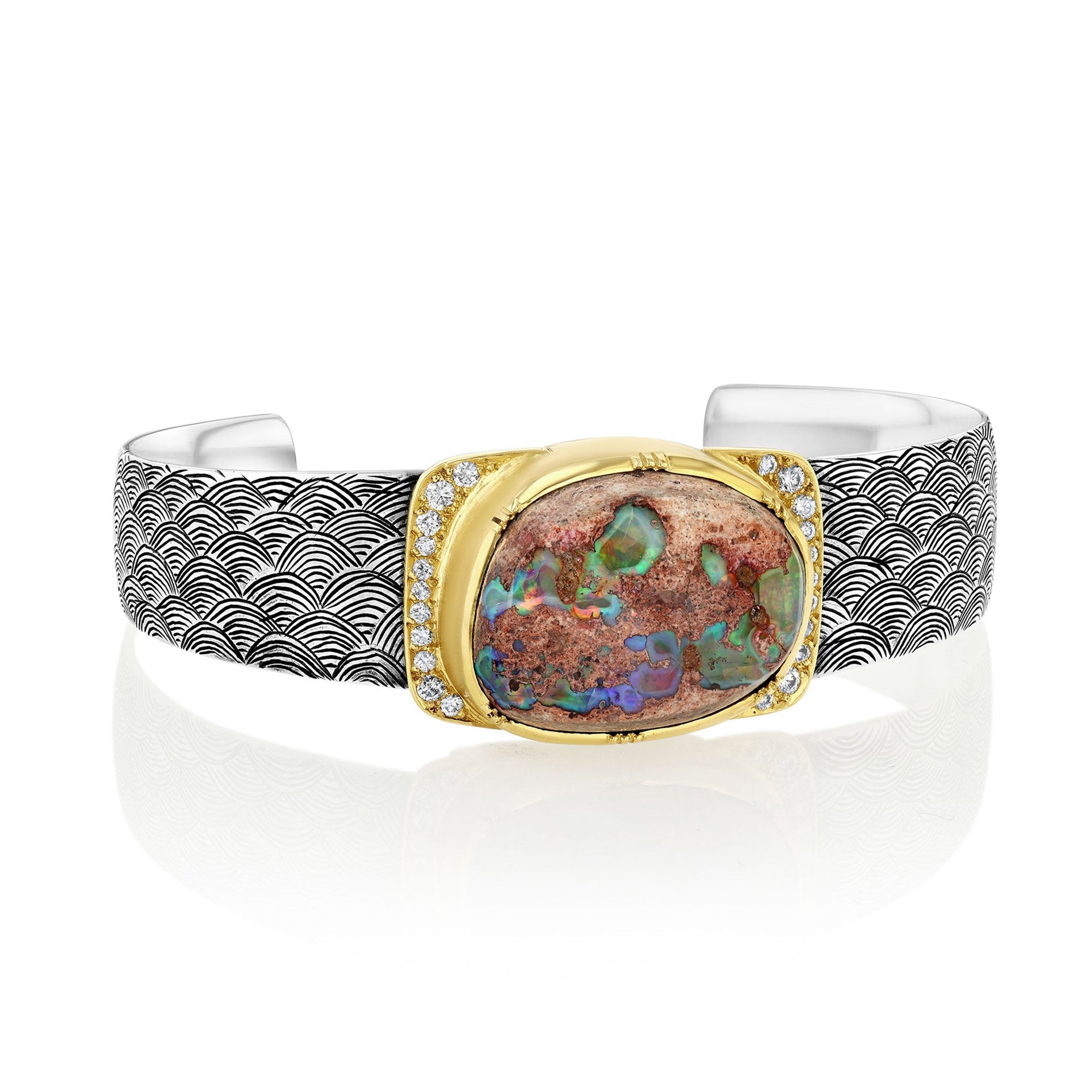 One of a kind 18k gold and silver hand engraved cuff bracelet featuring a central Matrix Fire Opal with diamond pave detail from Los Angeles jewelry designer Brooke Gregson