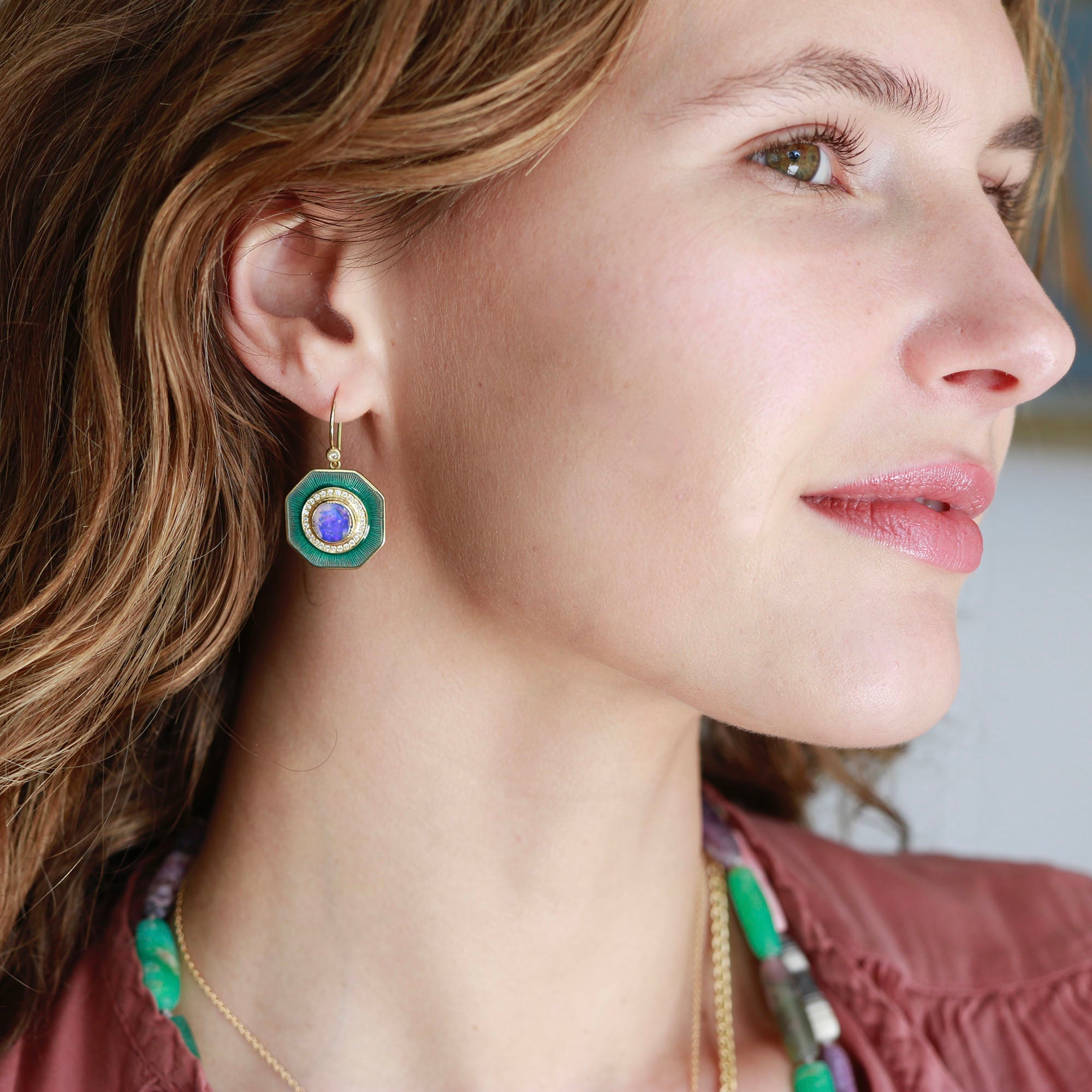 Model weaaring Wood Opal Galaxy Enamel Fine Jewelry Earrings in 18k gold by Los Angeles designer Brooke Gregson.