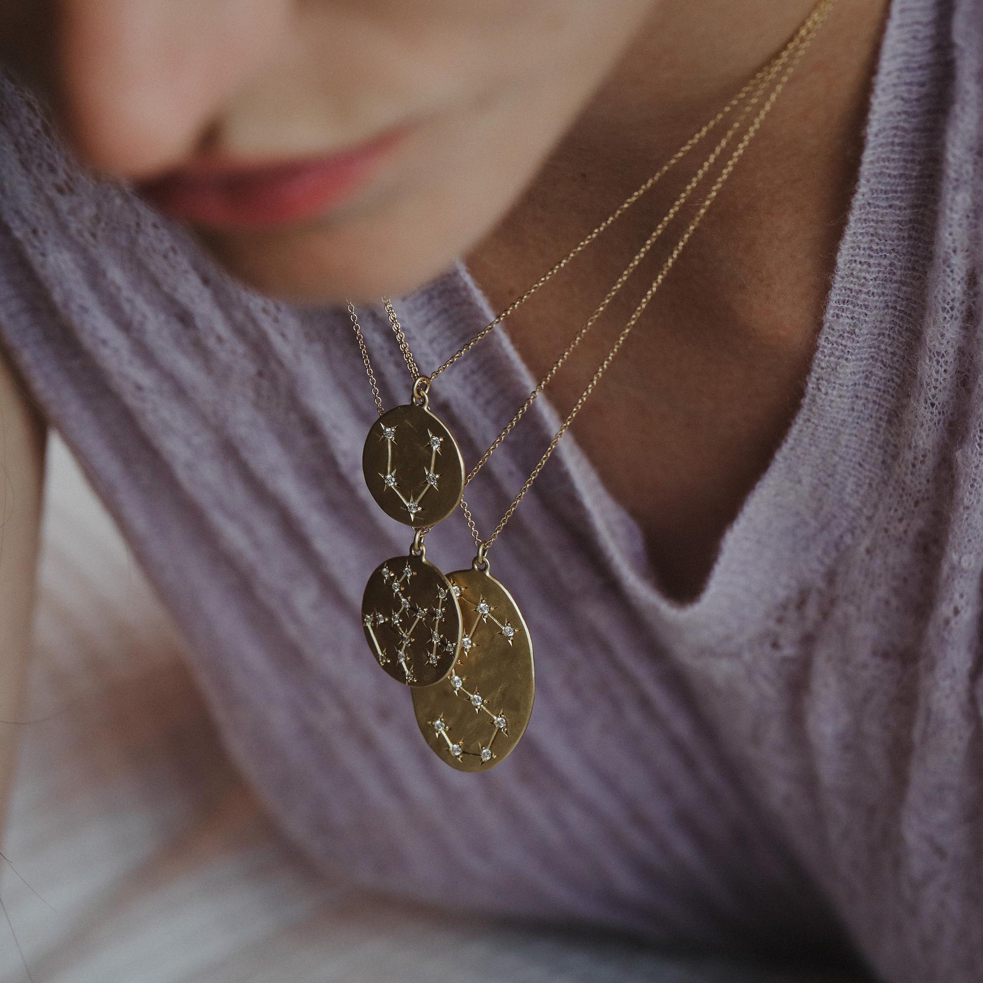 Model wearing Brooke Gregson Astrology Necklaces handmade in Los Angeles