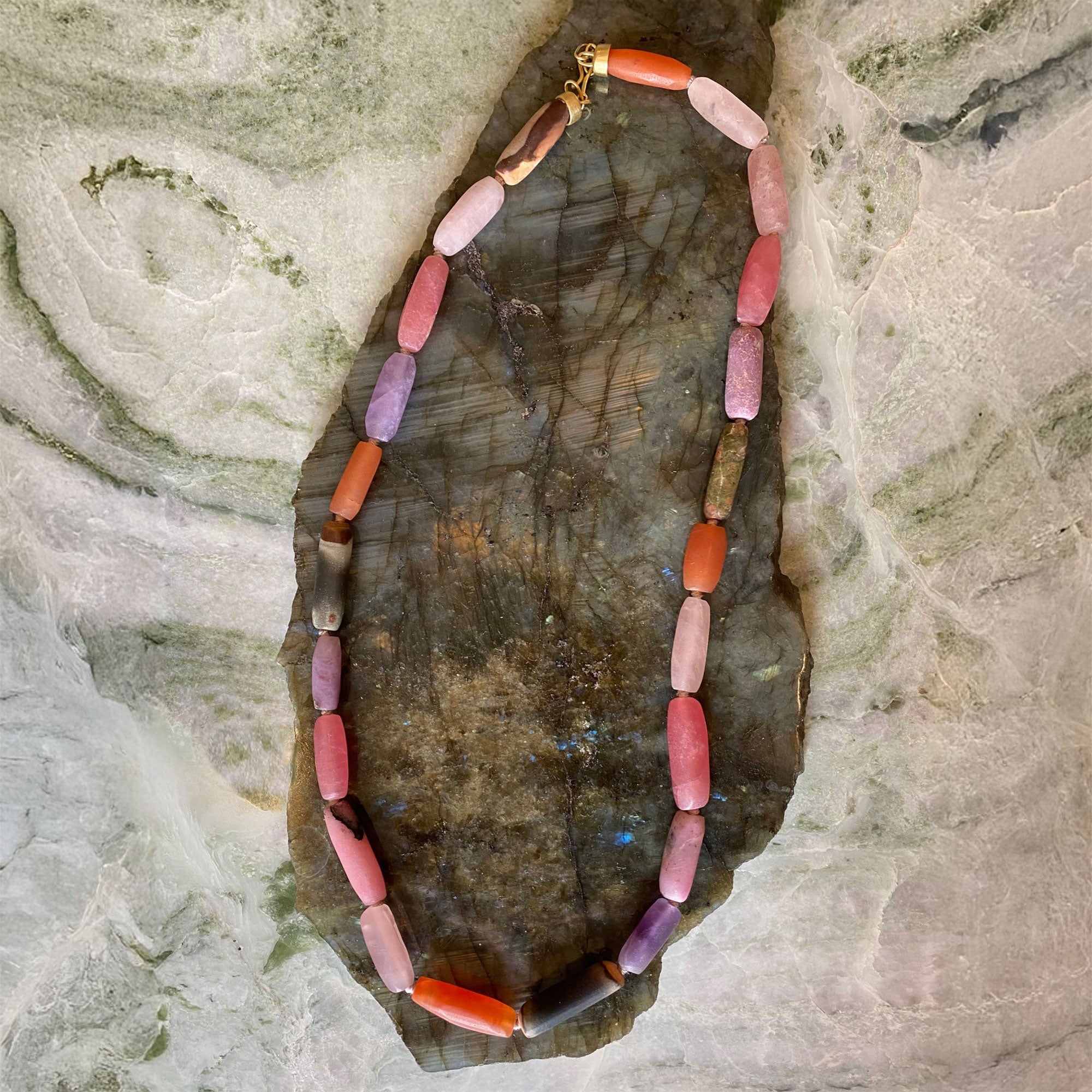 Hand honed beaded gemstone necklace in orange and pink tones from Los Angeles jewelry designer Brooke Gregson.
