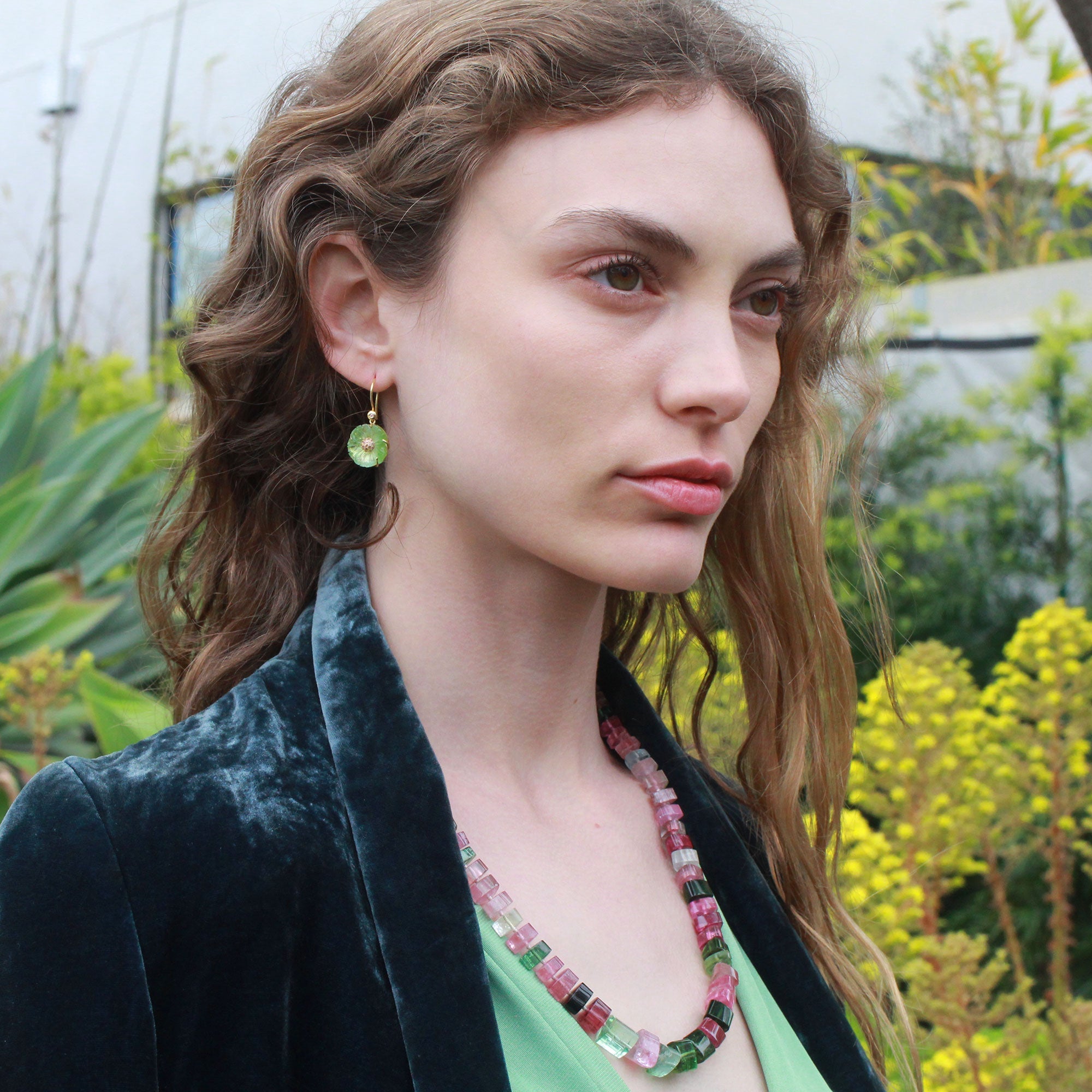 Model wearing gem quality mixed color tourmaline bead necklace with 18k gold clasp from Los Angeles designer Brooke Gregson.