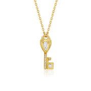 One of a kind 18k gold teardrop diamond heart key necklace with princess cut and full cut diamond pave from Los Angeles jewelry designer Brooke Gregson.