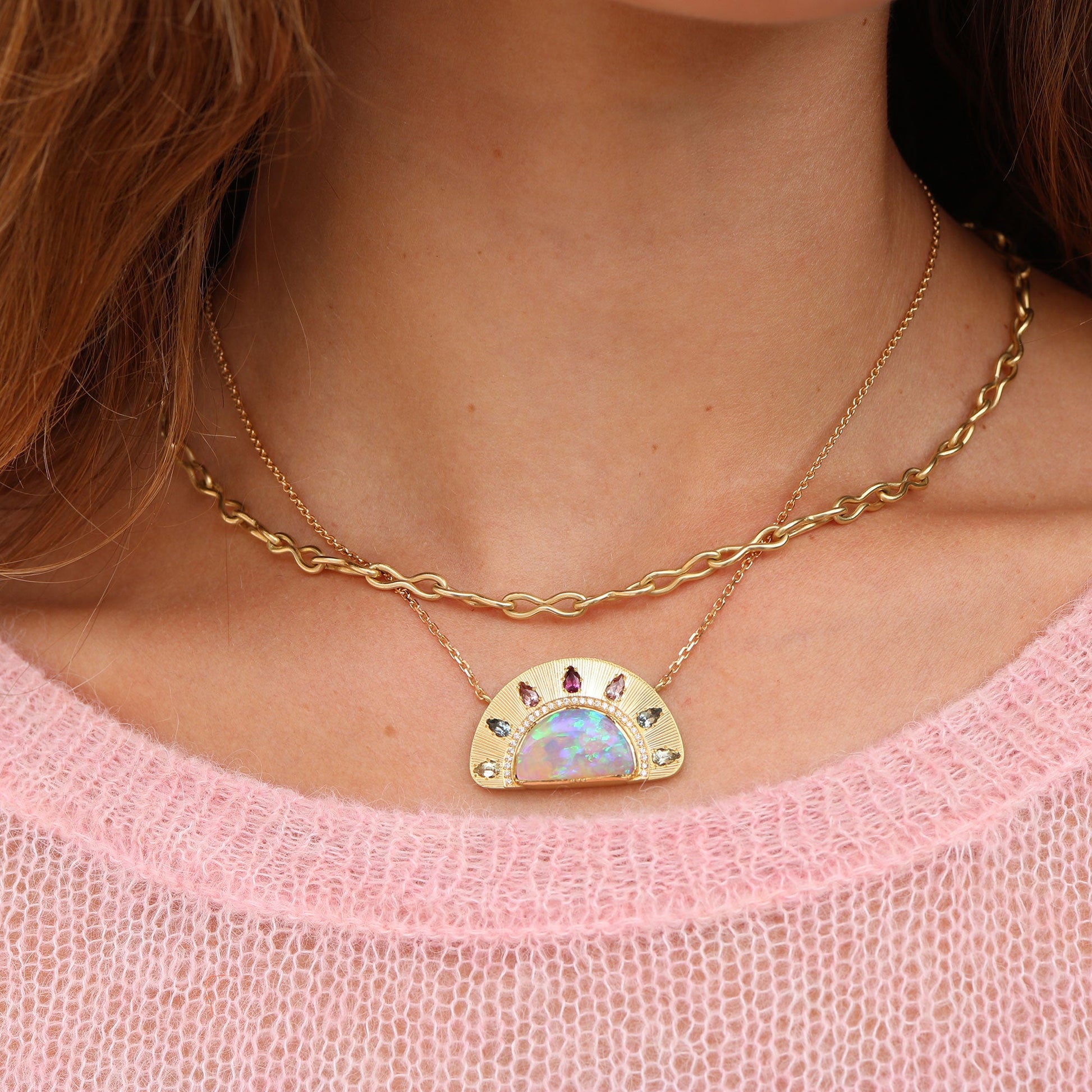 Model wearing one of a kind 18k gold Australian Opal necklace with sapphire and diamond from Los Angeles designer Brooke Gregson fine jewelry handmade in London.