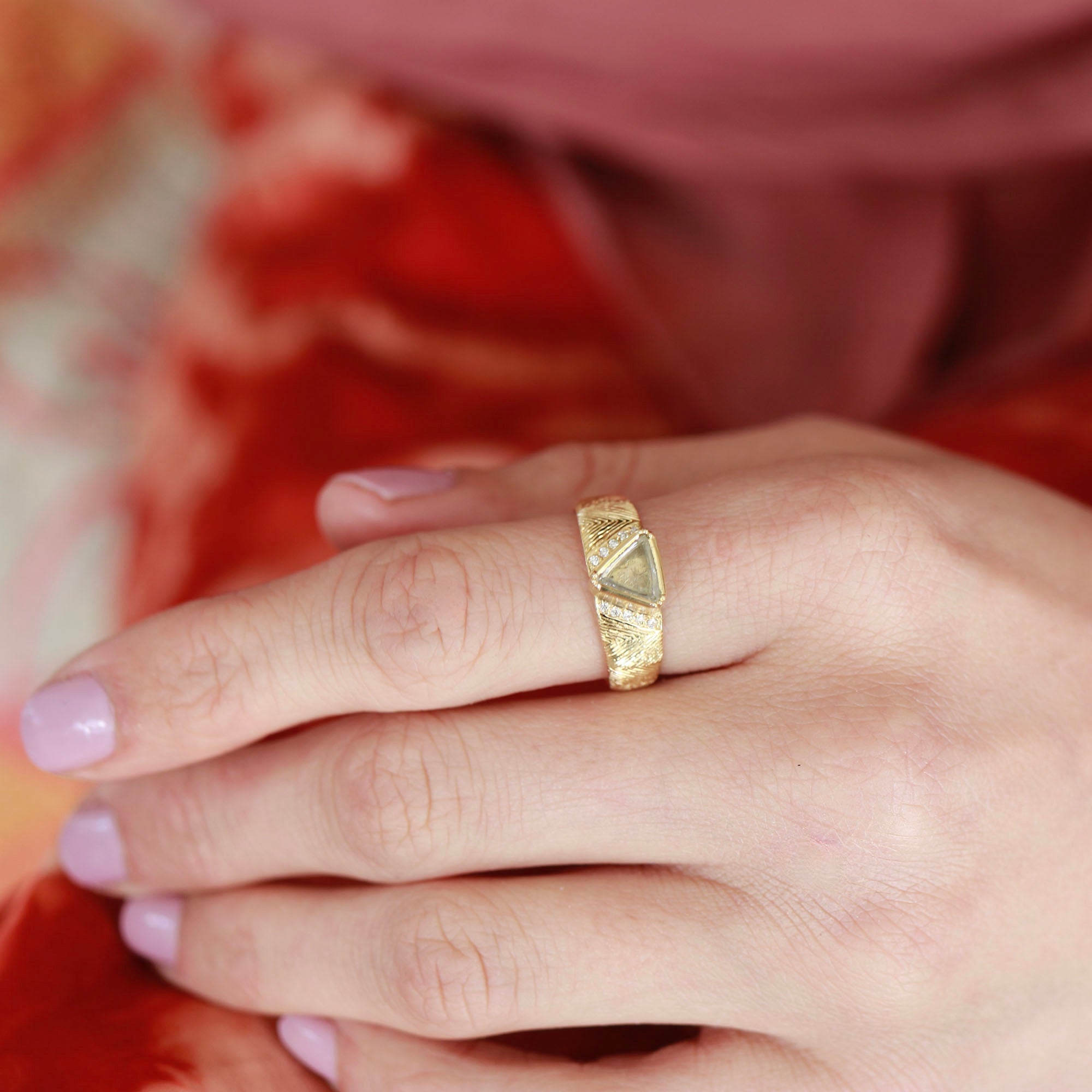 Model wearing one of a kind 18k gold hand engraved Macle Diamond ring with white diamond pave highlights from Los Angeles jewelry designer Brooke Gregson
