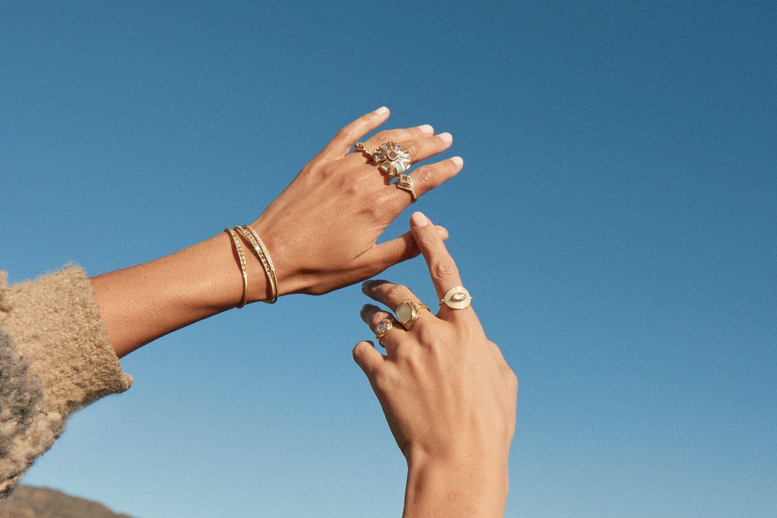 Model wearing 18k gold Diamond Rings by LA designer Brooke Gregson handmade in London