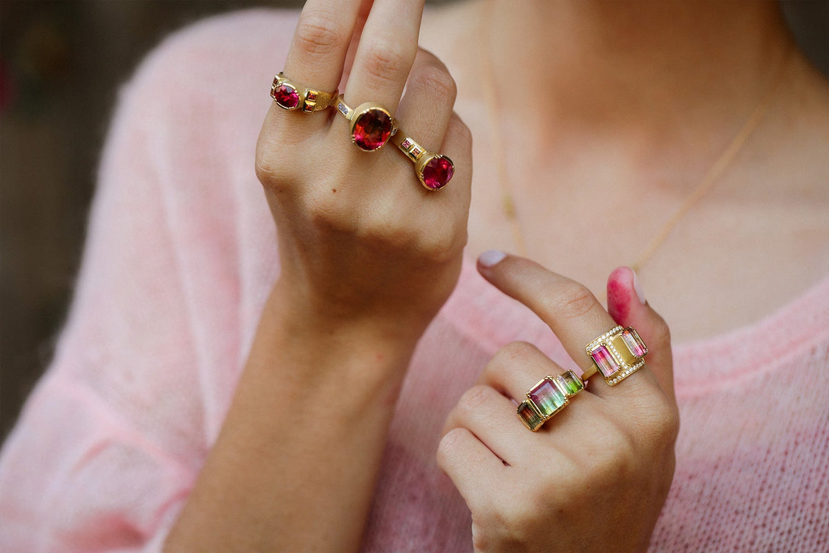 Hand holding Tourmaline Necklace by Los Angeles fine jewelry designer Brooke Gregson