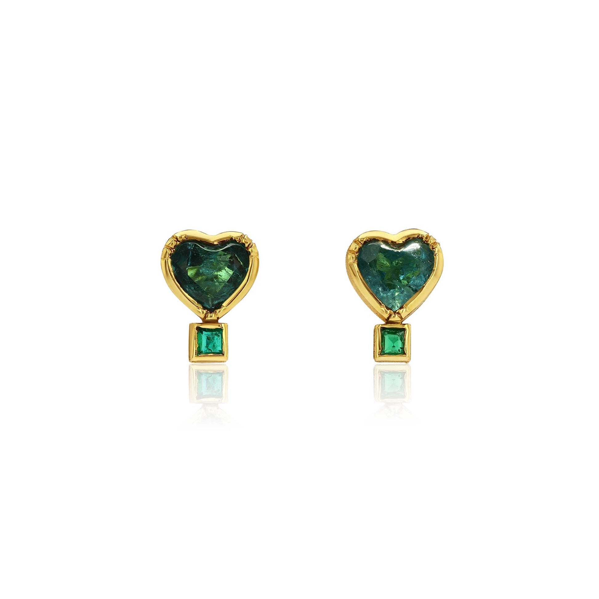 Gold heart shaped emerald and paraiba tourmaline stud earrings on a white background