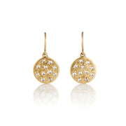 14k Gold earrings with circular designs and embedded diamond stones on a white background