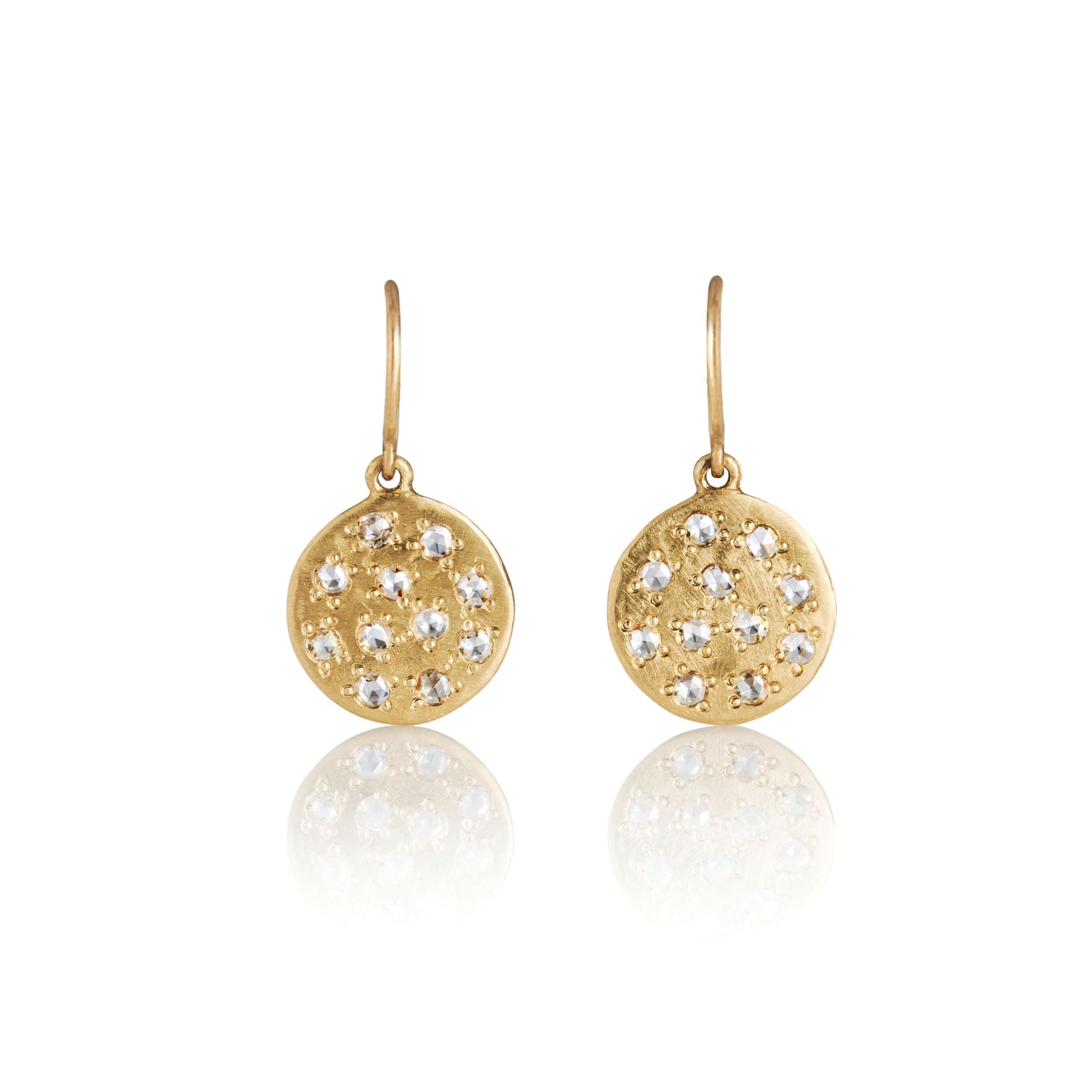 14k Gold earrings with circular designs and embedded diamond stones on a white background