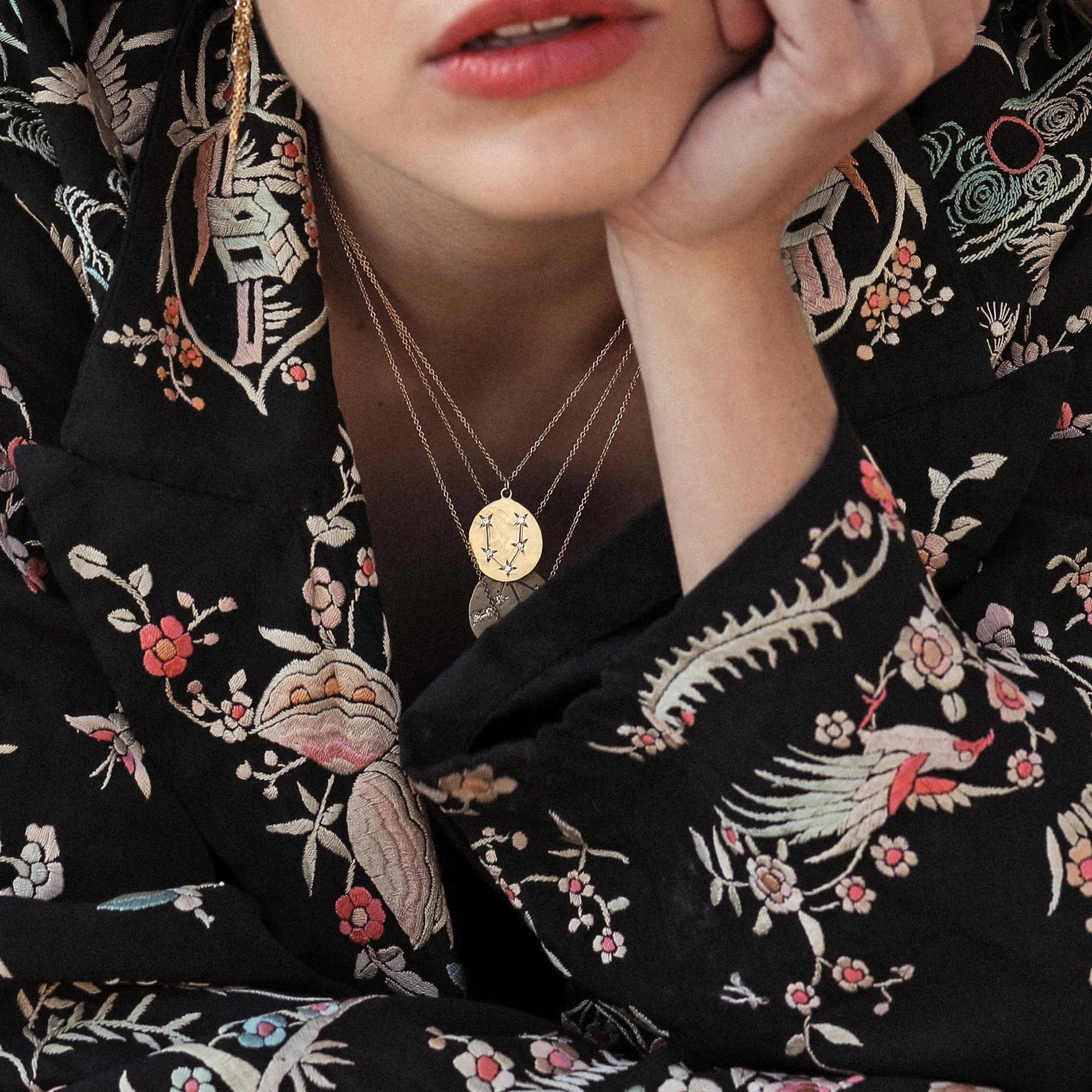 Model wearing Pisces Astrology Necklace with Diamond Star Sign constellation