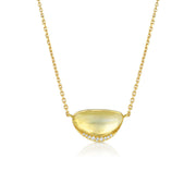 18k yellow gold necklace with a moonstone pendant with white diamond halo on a white background