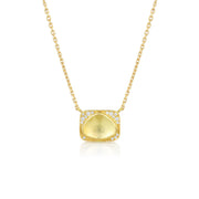 18k yellow gold necklace with a moonstone pendant and white diamond pave on a white background