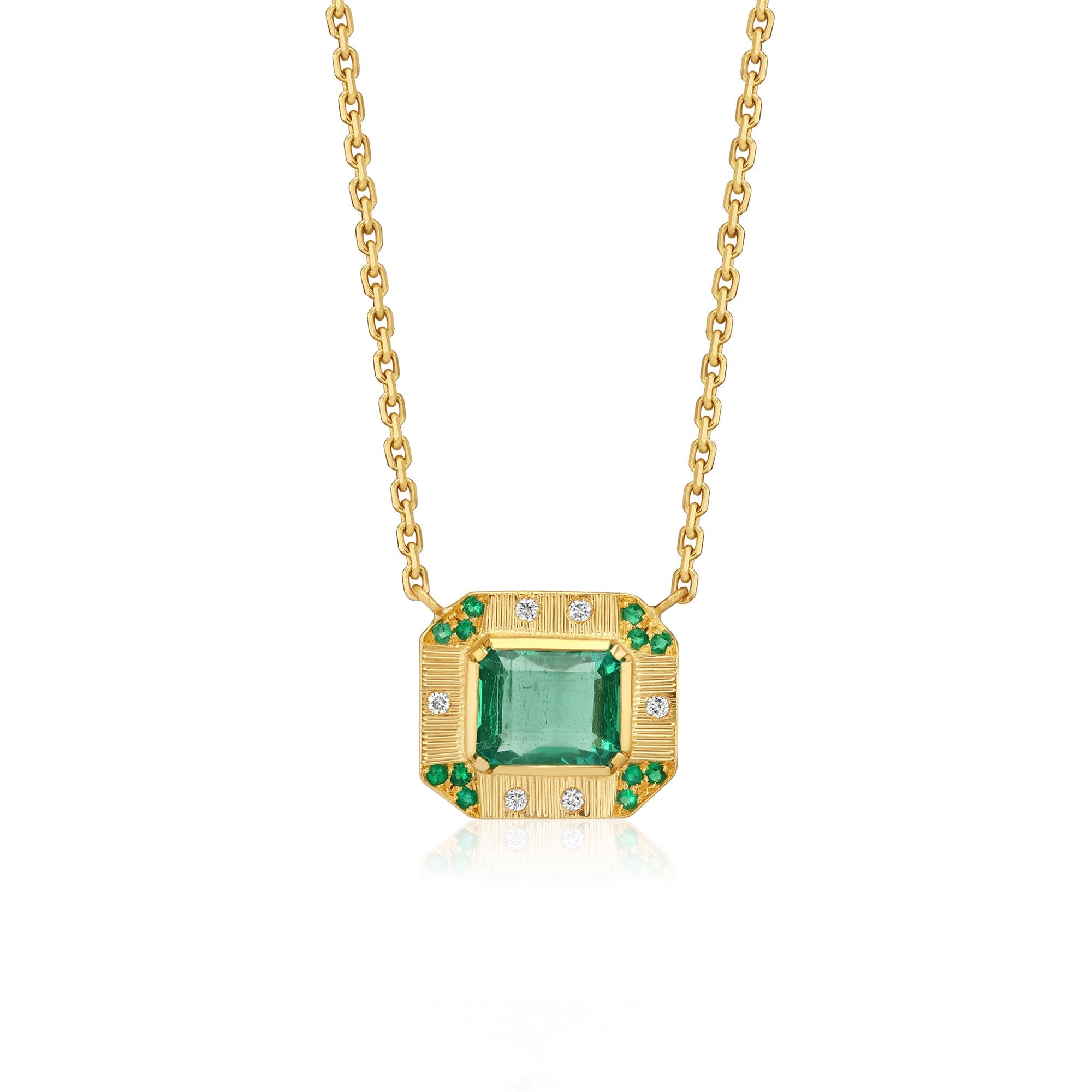 18k gold emerald necklace with hand engraving, emerald and diamond pave from Los Angeles designer Brooke Gregson fine jewelry handmade in London