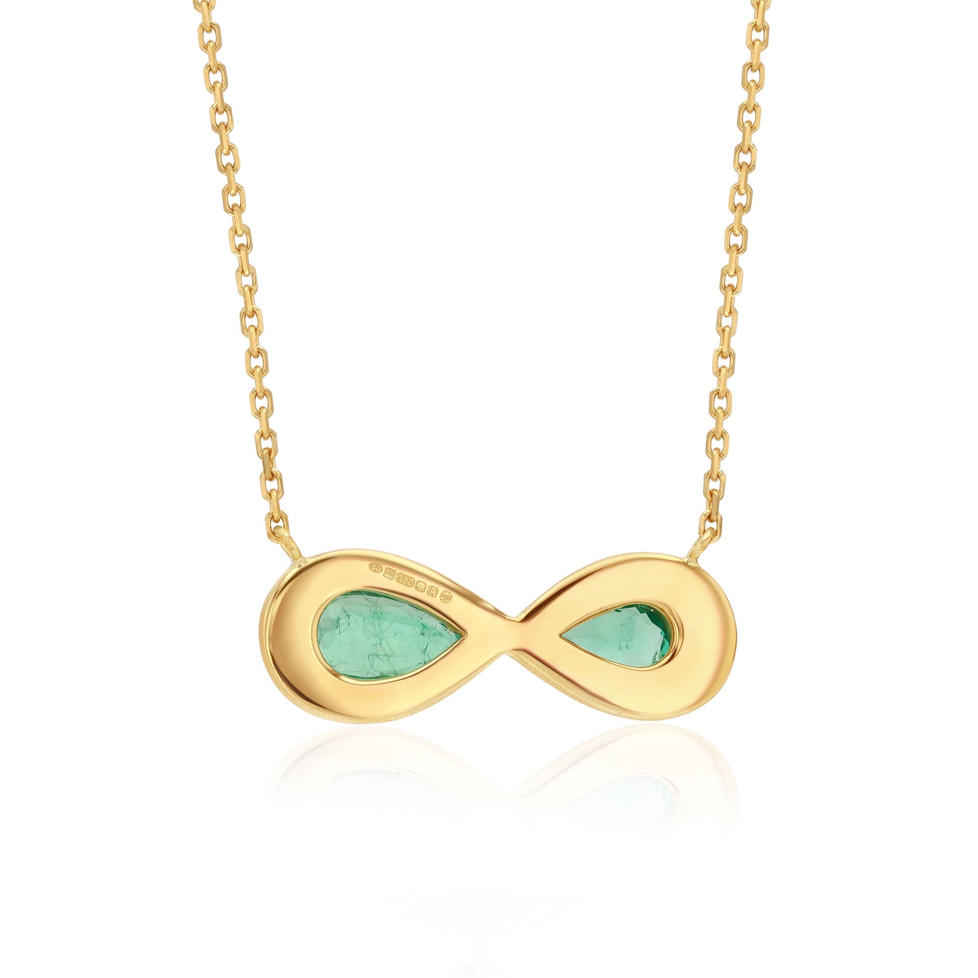 Back view one of a kind 18k gold hand engraved Emerald Infinity necklace from Los Angeles designer Brooke Gregson, dine jewelry handmade in London.