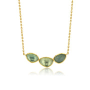 triple aquamarine necklace on a white background