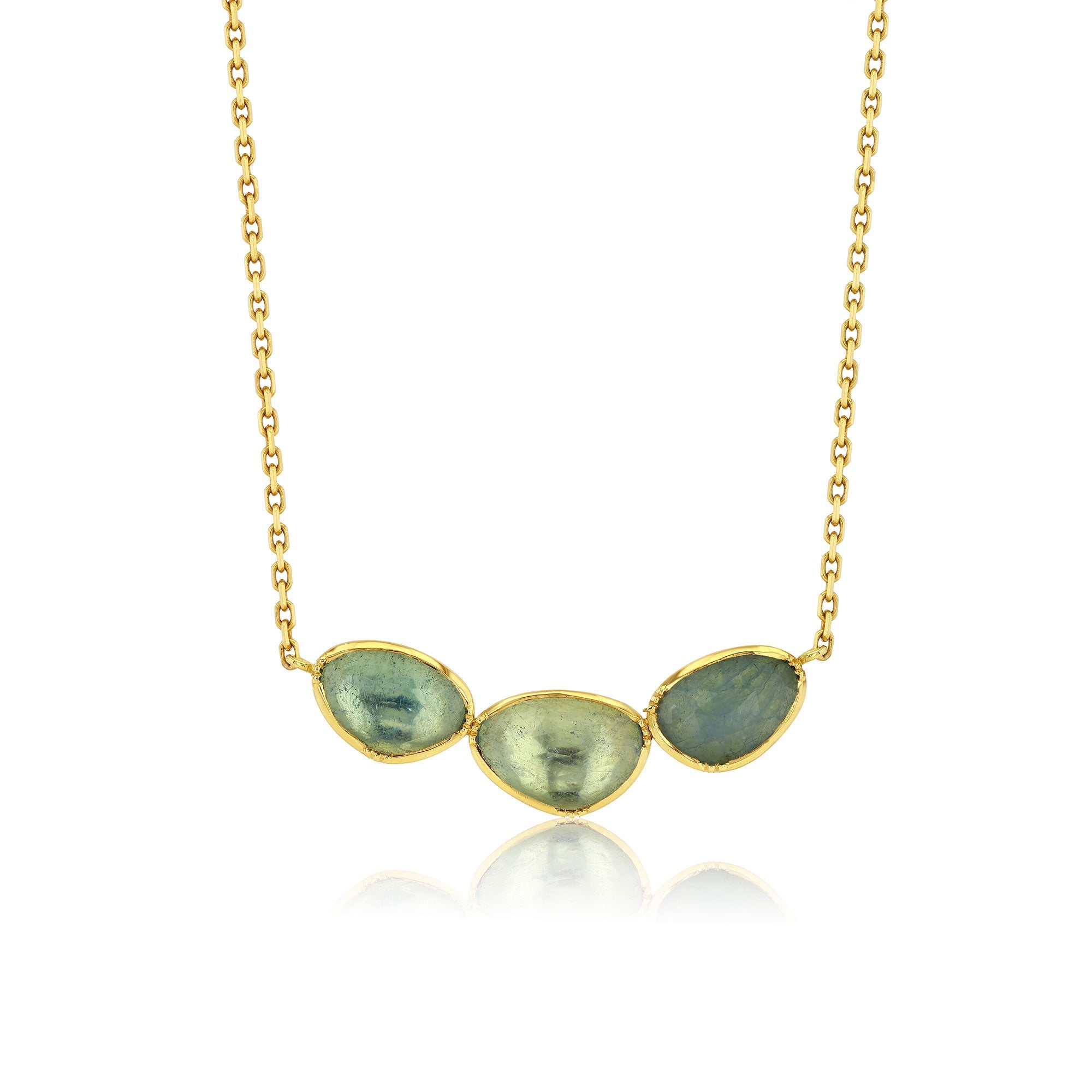 triple aquamarine necklace on a white background