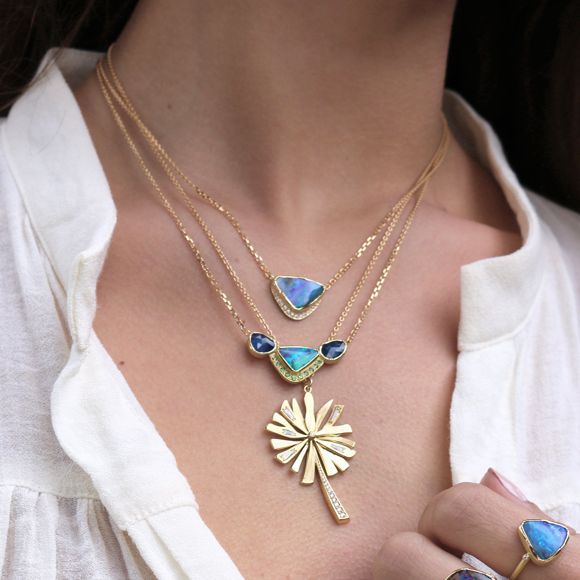 Model wearing Hand made in London Brooke Gregson 18k gold Boulder Opal Sapphire Tsavorite Necklace