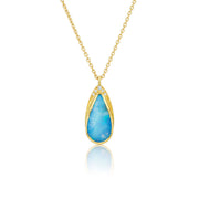 18k yellow gold necklace with a blue opal teardrop pendant with white diamond accents on a white background