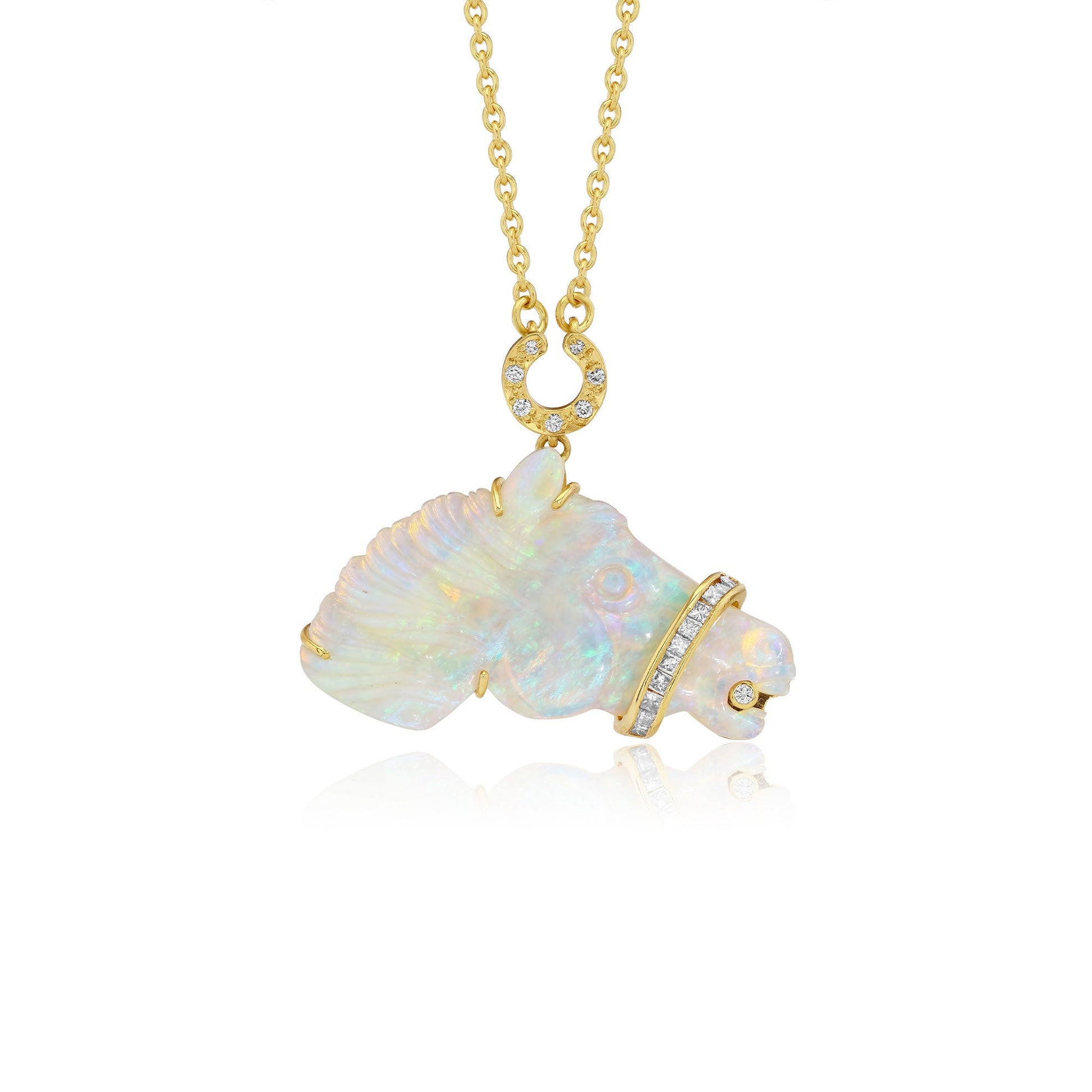 A gold pendant necklace featuring a stylized horse charm made of iridescent white australian opal with small diamond stones, suspended from a delicate gold chain on a white background.