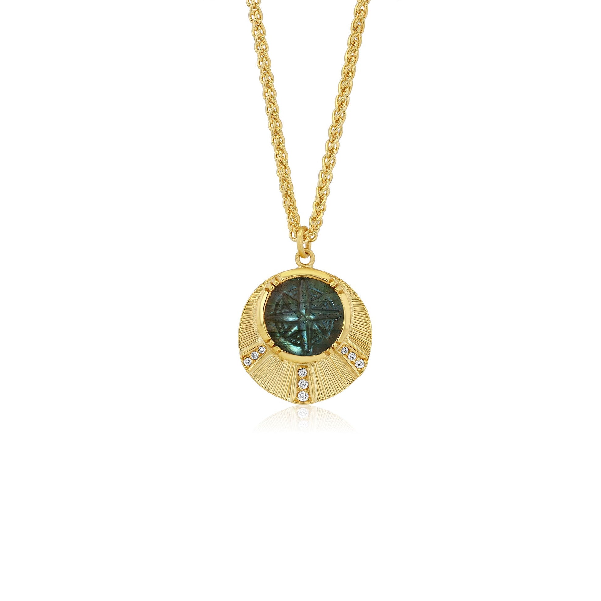 18k Gold necklace with a circular compass pendant featuring a labradorite stone with hand engraving and white diamond accents on a white background