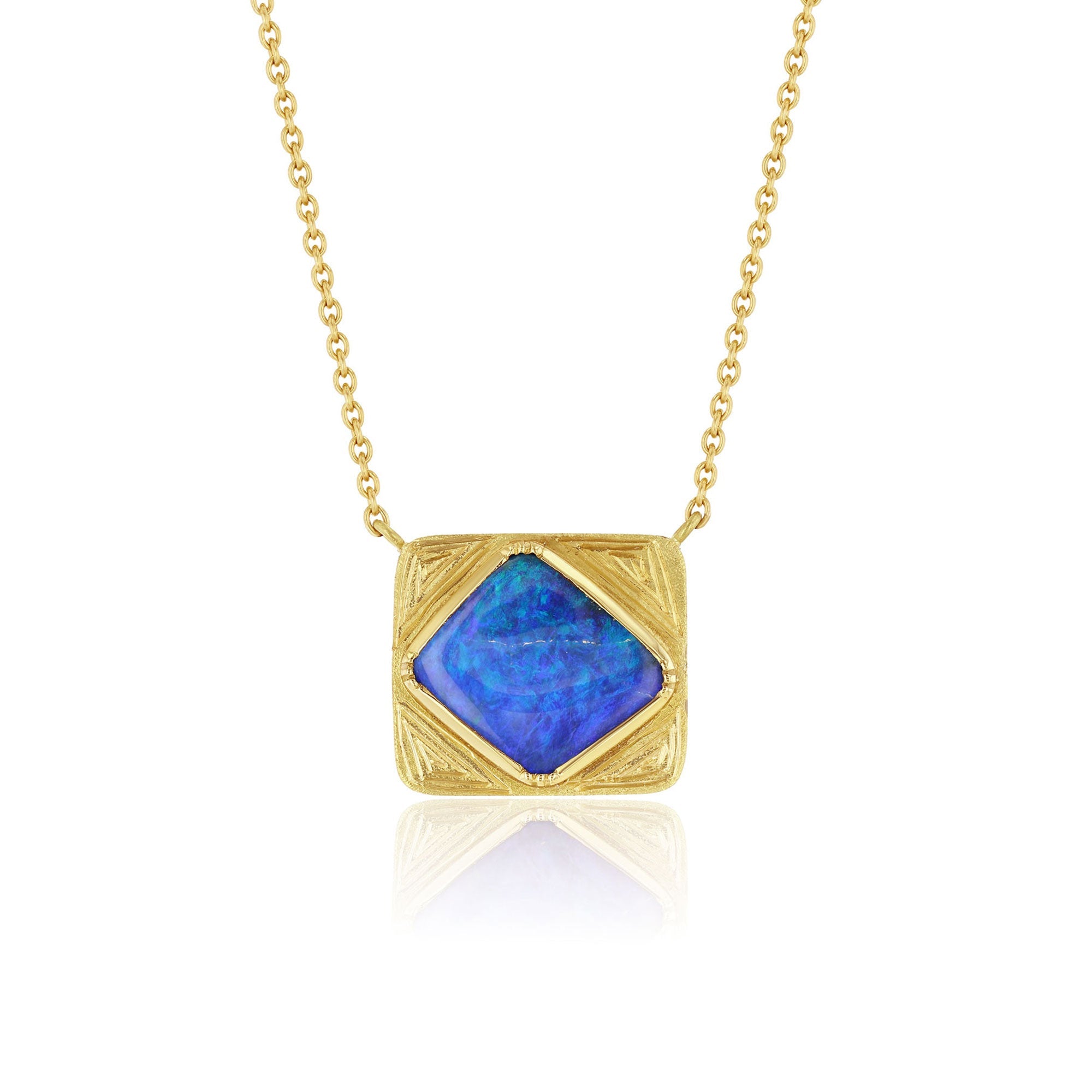 Handmade 18k gold Boulder Opal necklace with hand engraving. Fine jewelry hand made in London from Los Angeles designer Brooke Gregson.