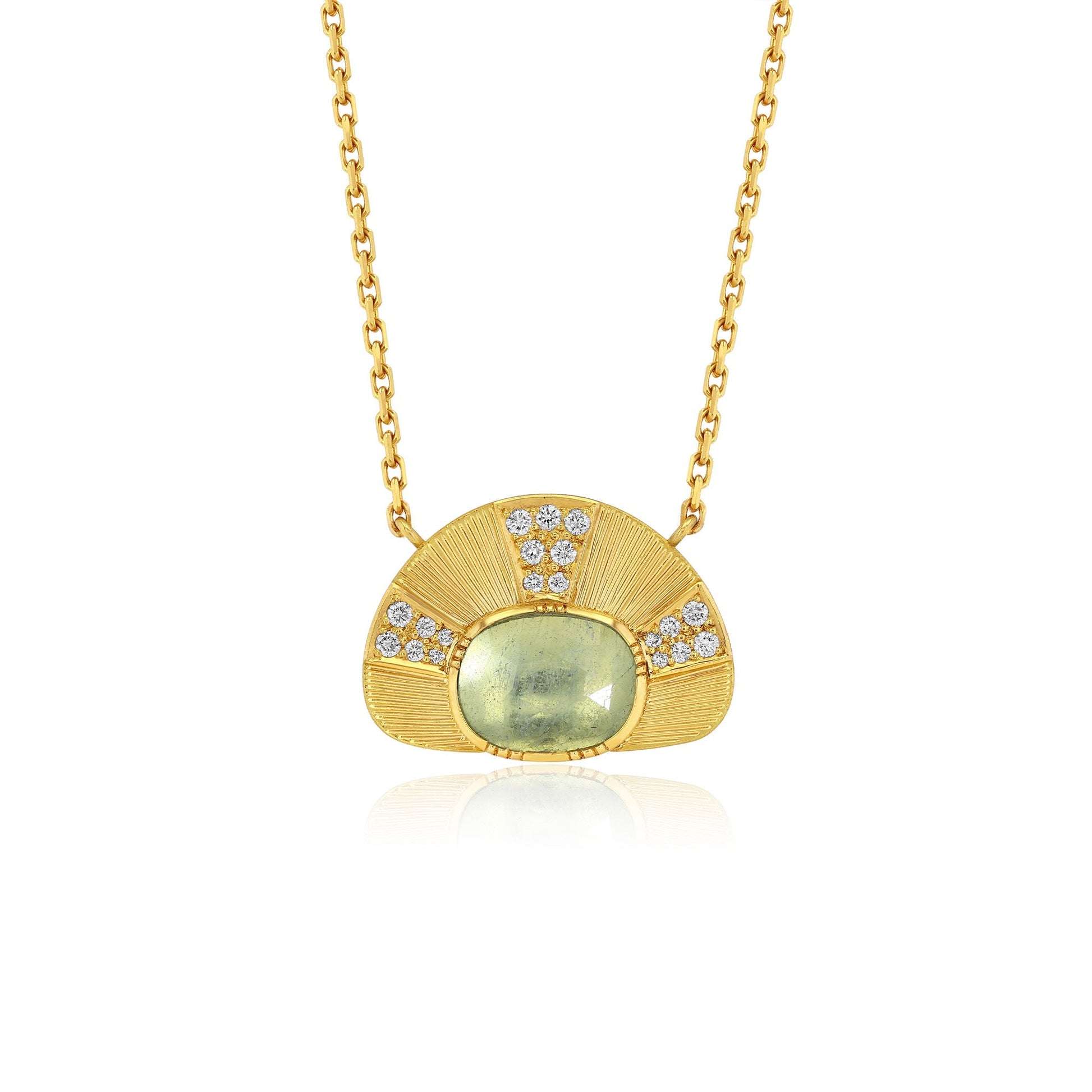 A gold pendant necklace featuring a fan-shaped design with a central oval light aquamarine green stone and small clear accent diamond stones, shown on a white background with a soft reflection.