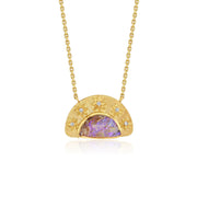 A gold pendant necklace featuring a semi-circular gold frame with small star details and tiny diamond stones, surrounding a central purple opal inlay. The necklace is displayed on a clean white background with a soft reflection.