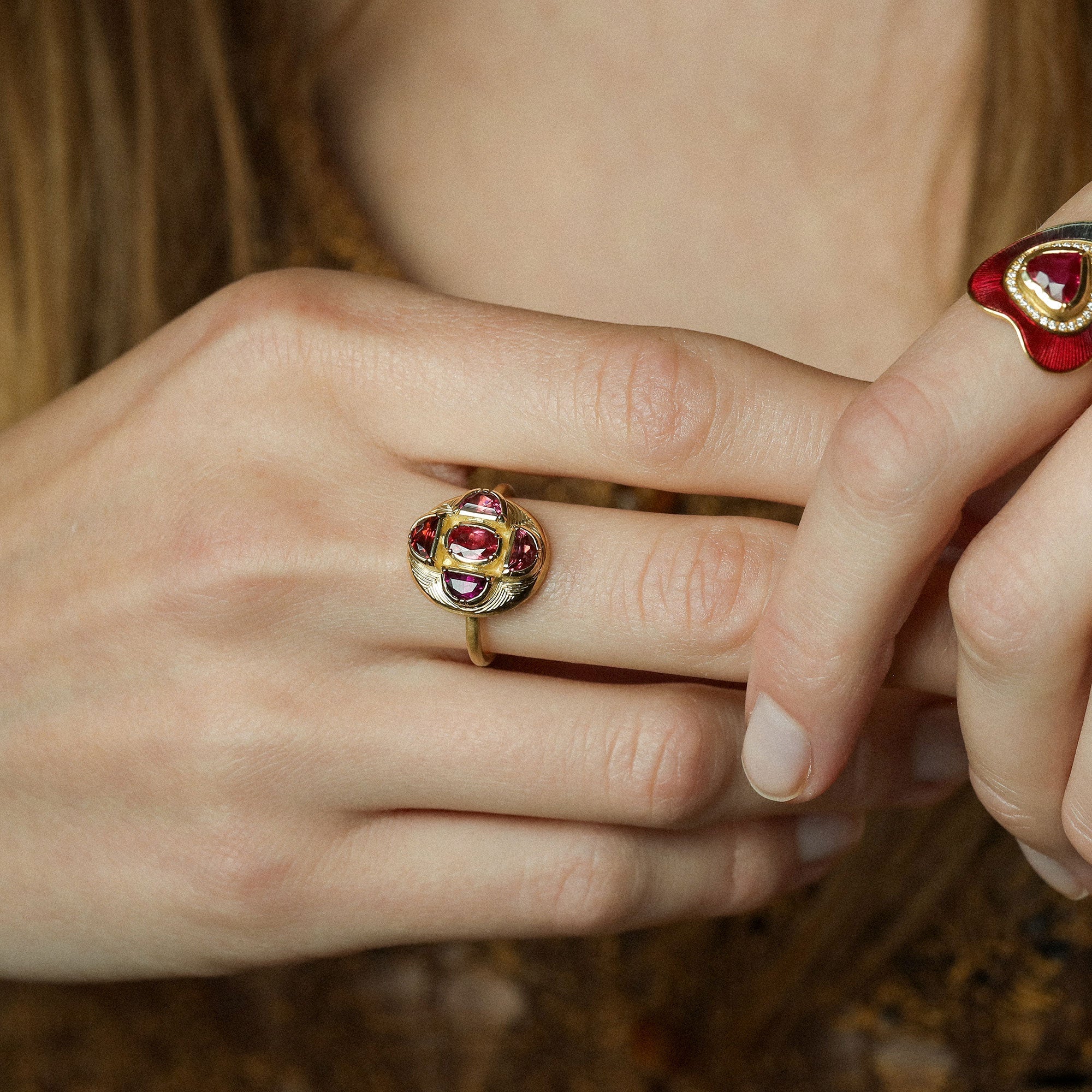 Model wearing One of a kind Ruby and Tourmaline Ring with hand engraving from Los Angeles designer Brooke Gregson handmade in London