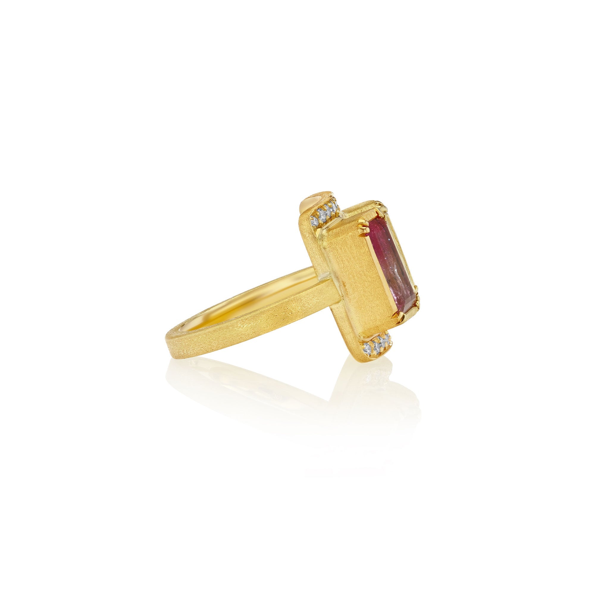 Side view of 18k gold ring with bi colour tourmaline gemstones and pave diamonds on a white background by Brooke Gregson.