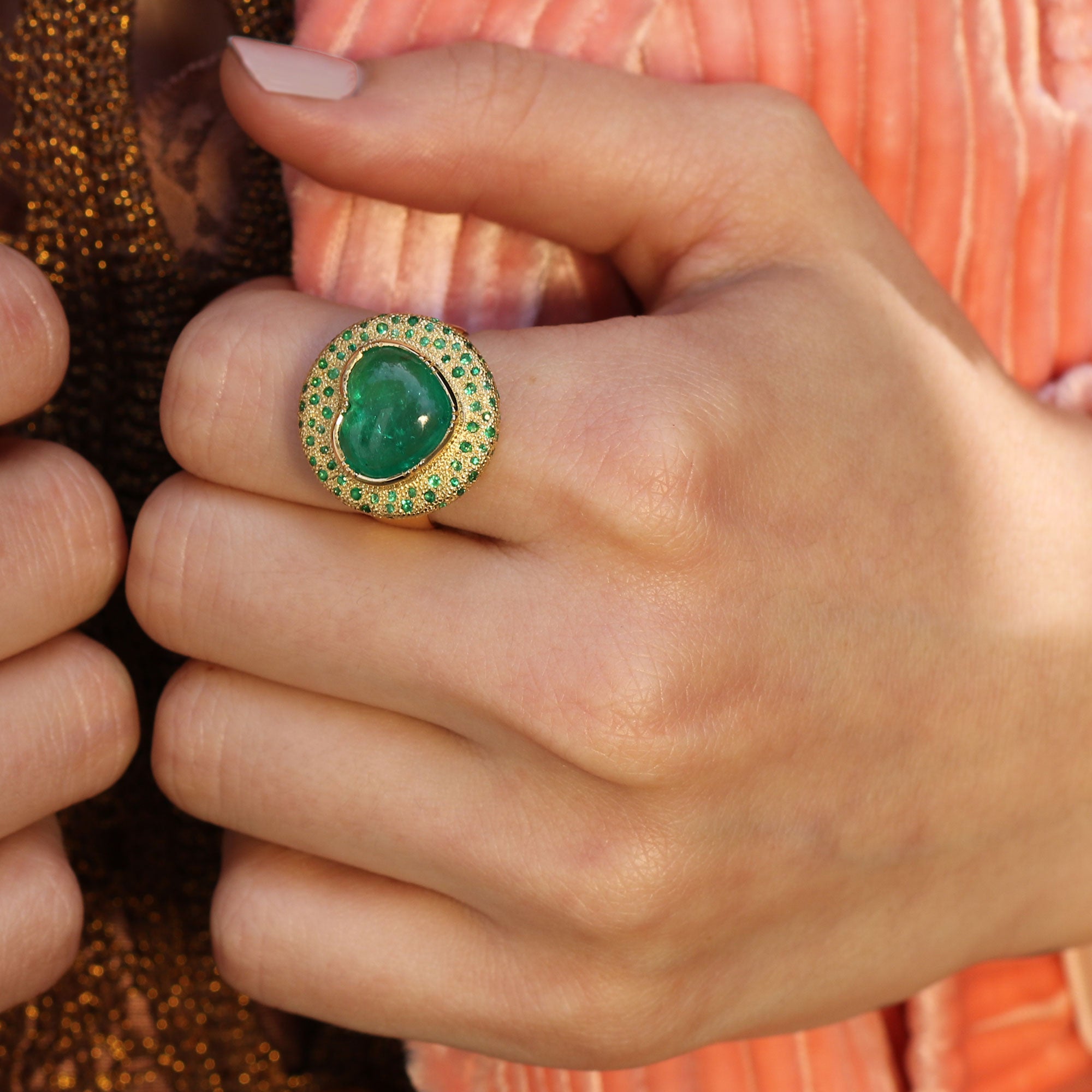 Model wearing One of a kind Emerald Heart Chakra Ring from Los Angeles designer Brooke Gregson handmade in London