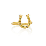 Gold horseshoe-shaped ring with embedded mixed rosecut diamond stones on a white background
