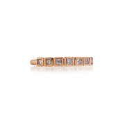 14k rose gold ring with pink princess cut diamonds photographed on a white background designed by brooke gregson
