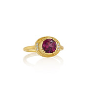 Brooke Gregson one-of-a-kind Rhodolite garnet halo ring in 18k gold with white diamond accents