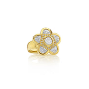 Product shot of 18k gold white diamond ring in a flower shape made by jewelry designer brooke gregson on a white background.