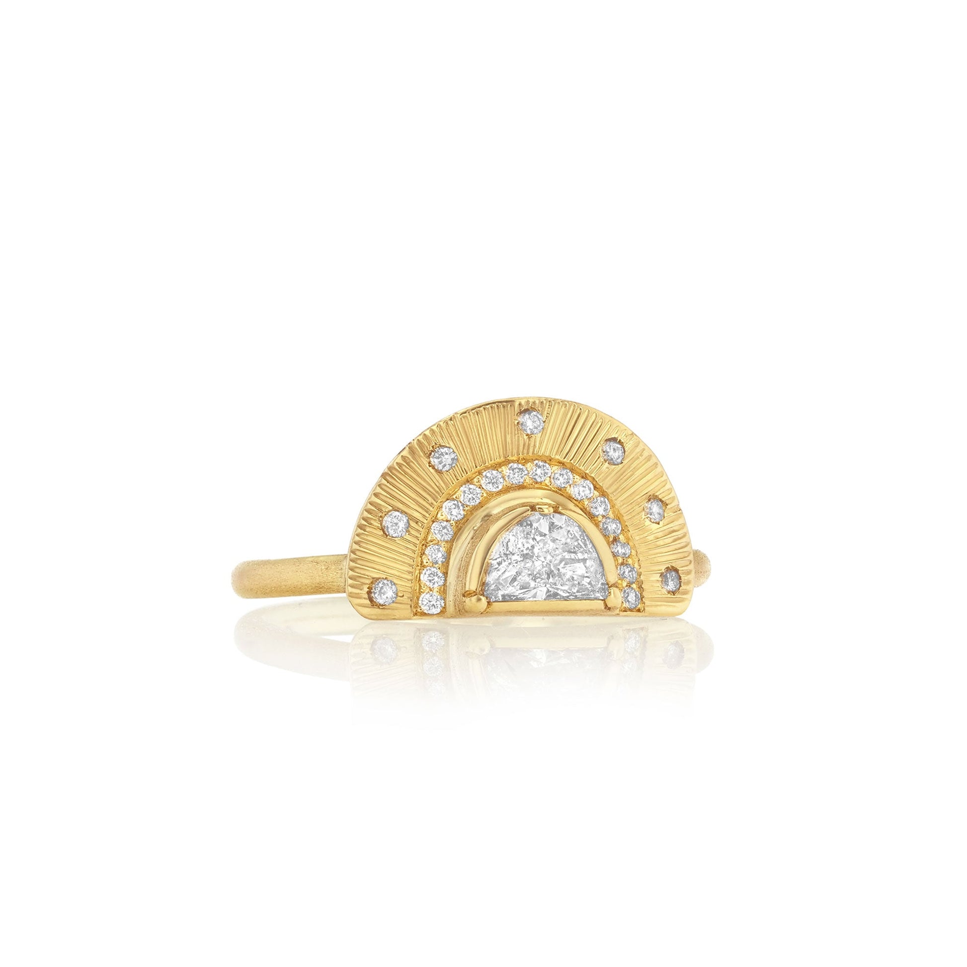 18k gold ring with white diamonds and hand engraving on a white background.