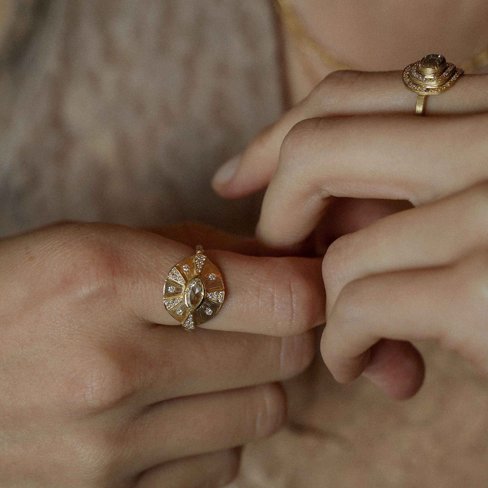 Model wearing One of a kind Diamond Talisman Ring with hand engraving from Los Angeles designer Brooke Gregson handmade in London